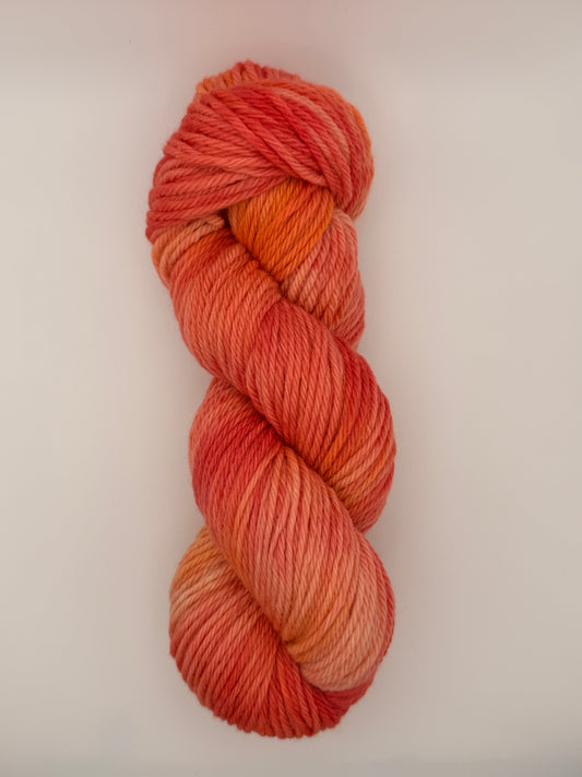 Hand dyed yarn available in 4ply sock, DK, Aran in Coral Crush colourway – Coral and Apricot tones