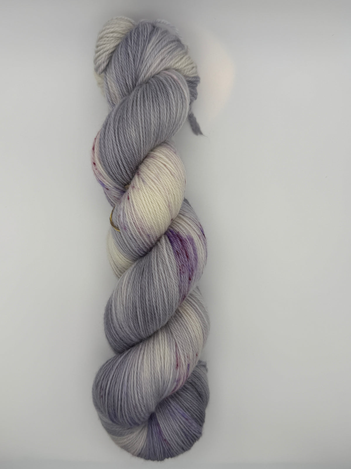 Hand dyed yarn uk, yarn dyed in small batches, geode available in Aran, DK 4 ply, sock, double knit, white, grey, purple tones.