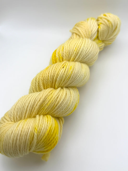 Hand dyed yarn UK available in 4ply sock, aran, DK in Lemon Posset colourway – Lemon, Yellow and Citrus tones.