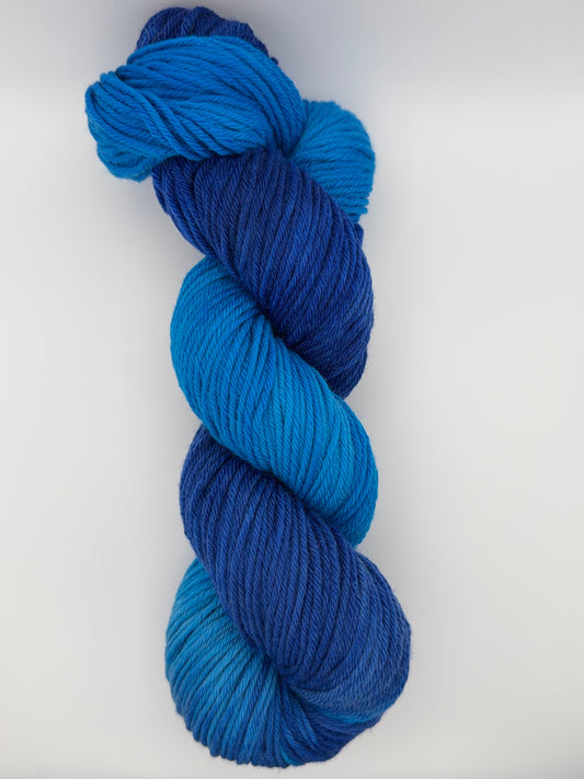 Hand dyed yarn uk 4ply sock aran dk yarn in Midnight Tide colourway – blue and teal tones