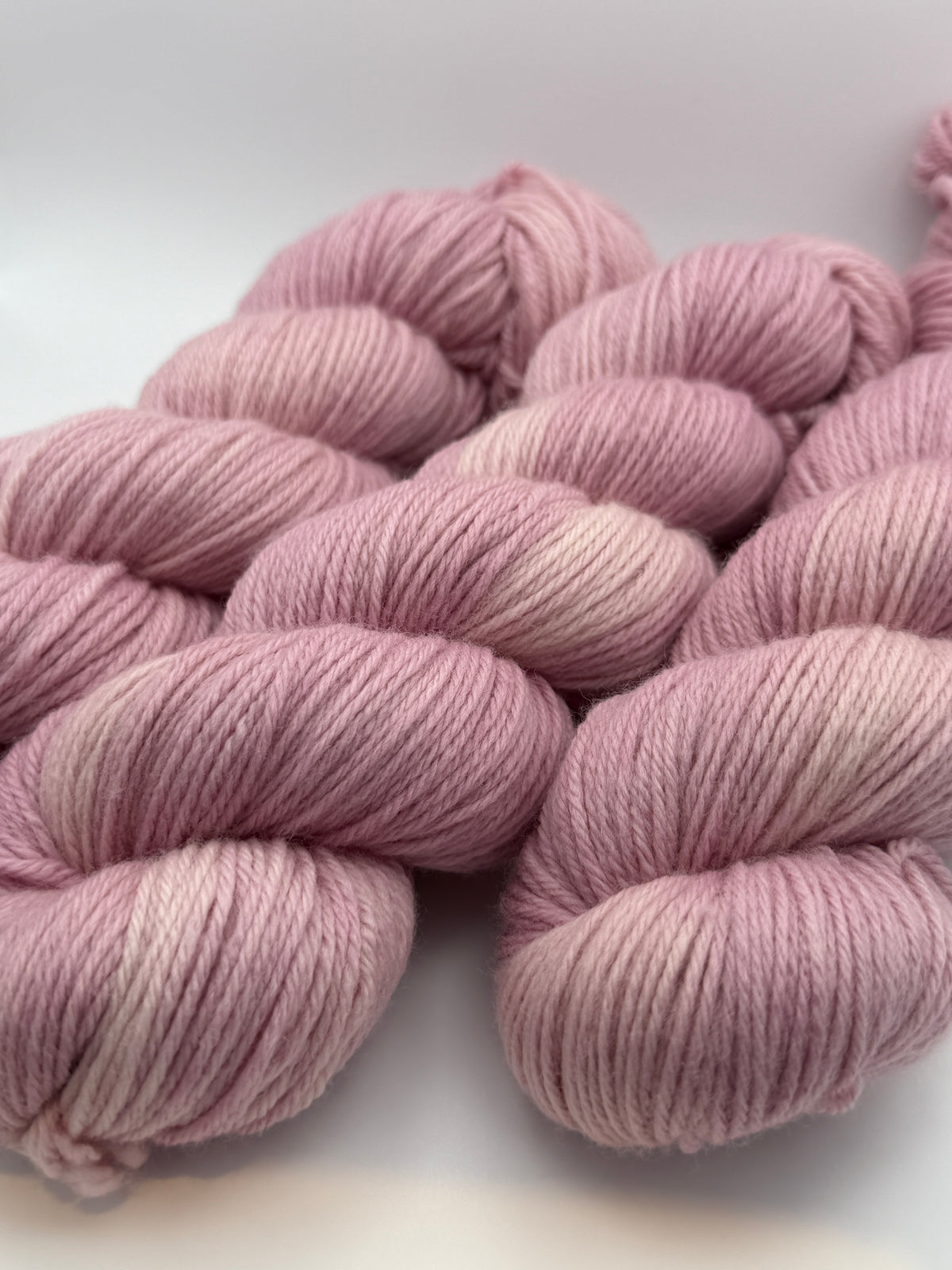 Hand dyed yarn uk, yarn dyed in small batches, Blossom available in Aran, DK 4 ply, sock, double knit, pink tones.