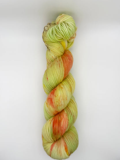 Hand dyed yarn in the UK dyed in small batches. Citrus Salad. Lemon, lime, orange, grapefruit tones.