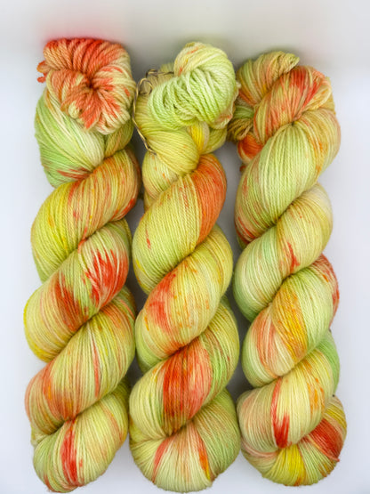 Hand dyed yarn in the UK dyed in small batches. Citrus Salad. Lemon, lime, orange, grapefruit tones.