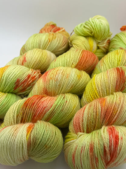 Hand dyed yarn in the UK dyed in small batches. Citrus Salad. Lemon, lime, orange, grapefruit tones.