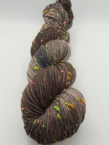 Hand dyed yarn in the UK dyed in small batches. Forest Floor, brown and grey tones with neo nep spekles.