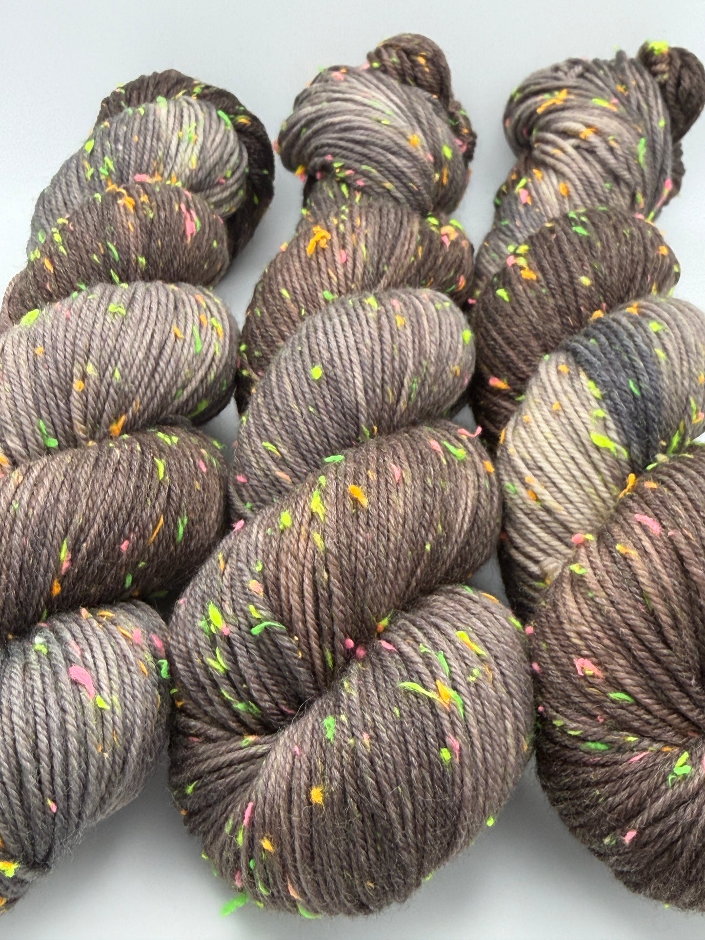 Hand dyed yarn in the UK dyed in small batches. Forest Floor, brown and grey tones with neo nep spekles.