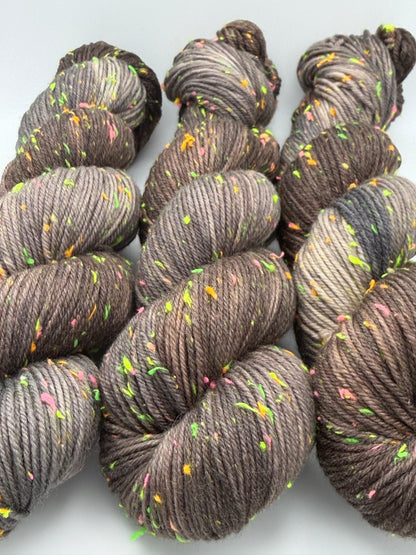 Hand dyed yarn in the UK dyed in small batches. Forest Floor, brown and grey tones with neo nep spekles.