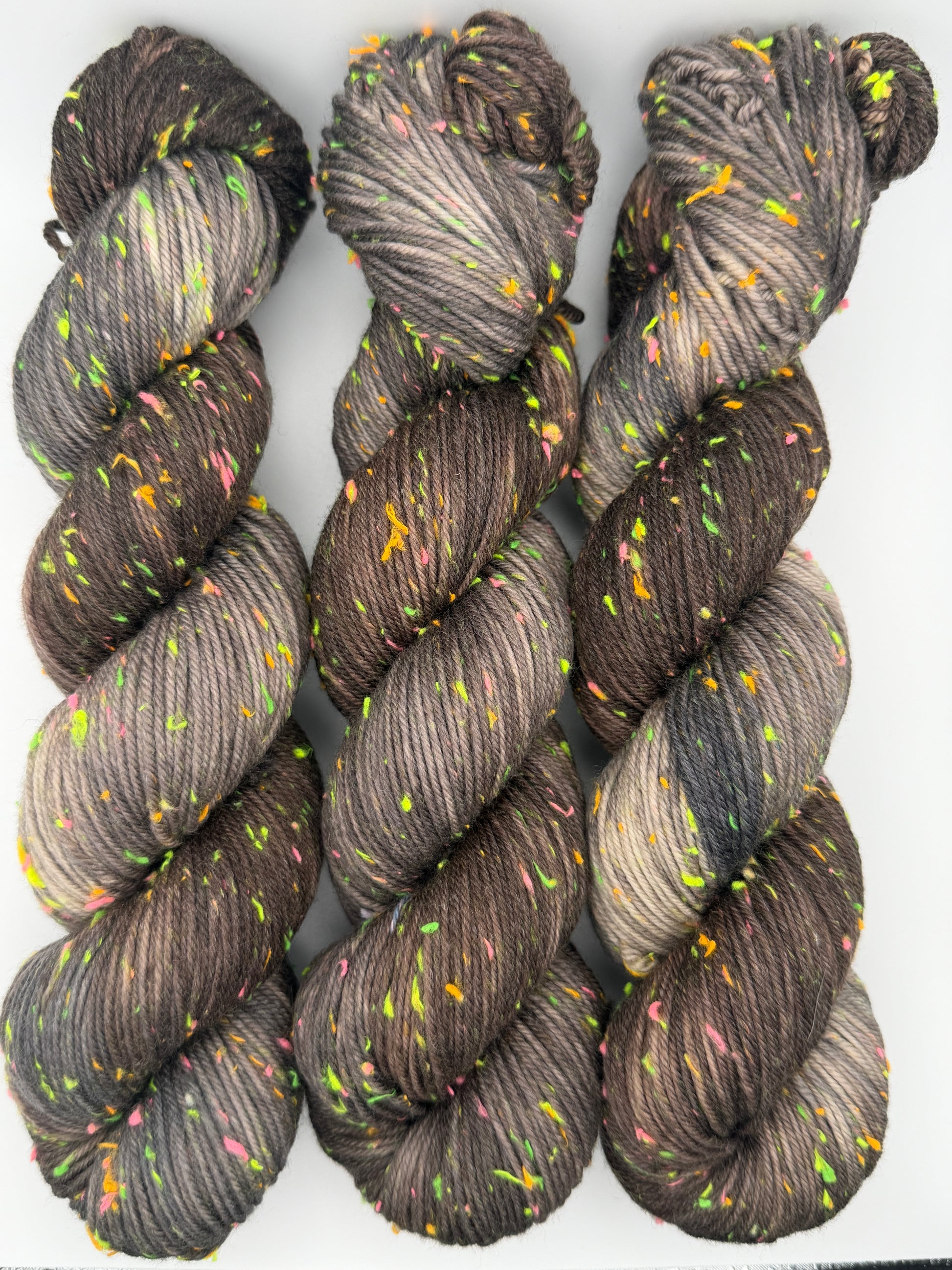 Hand dyed yarn in the UK dyed in small batches. Forest Floor, brown and grey tones with neo nep spekles.