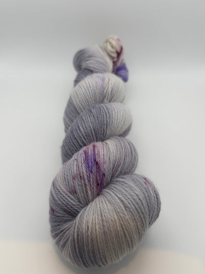 Hand dyed yarn uk, yarn dyed in small batches, geode available in Aran, DK 4 ply, sock, double knit, white, grey, purple tones.