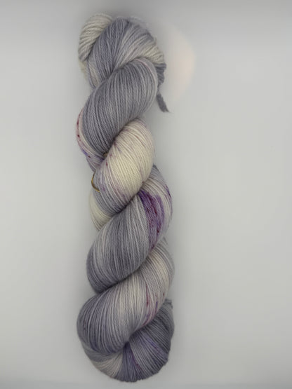 Hand dyed yarn uk, yarn dyed in small batches, geode available in Aran, DK 4 ply, sock, double knit, white, grey, purple tones.