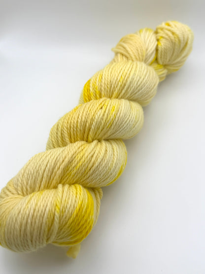 Hand dyed yarn UK available in 4ply sock, aran, DK in Lemon Posset colourway – Lemon, Yellow and Citrus tones.