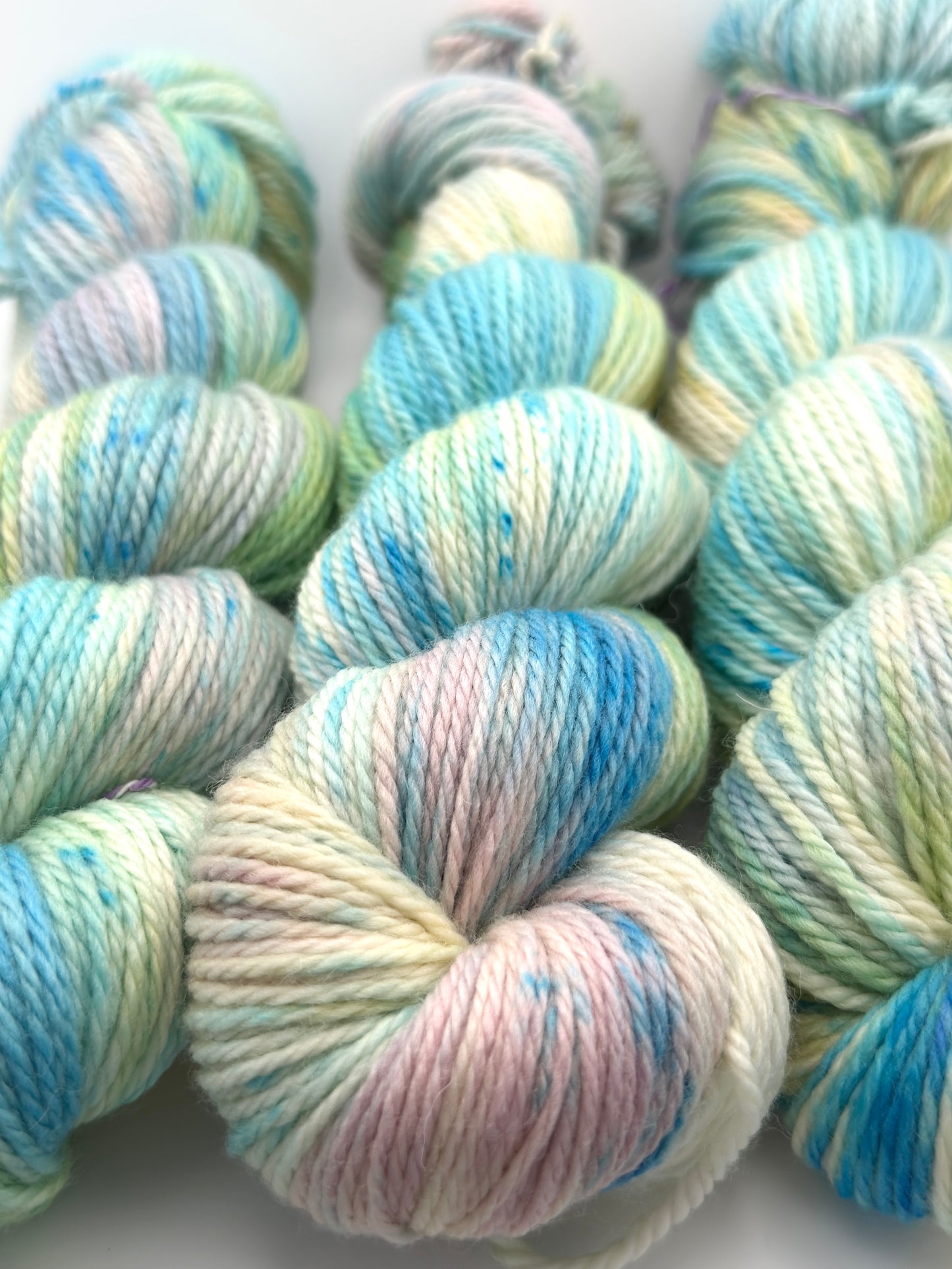 Hand dyed yarn uk, yarn dyed in small batches, Washed up available in Aran, DK 4 ply, sock, double knit, blue, yellow, green, pink tones.