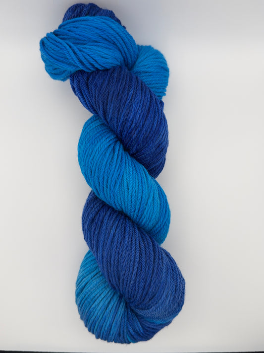 Hand dyed yarn uk 4ply sock aran dk yarn in Midnight Tide colourway – blue and teal tones