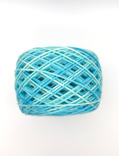Hand dyed yarn available in 4ply sock, aran, DK in Blue Lagoon colourway – blue, teal, aqua tones