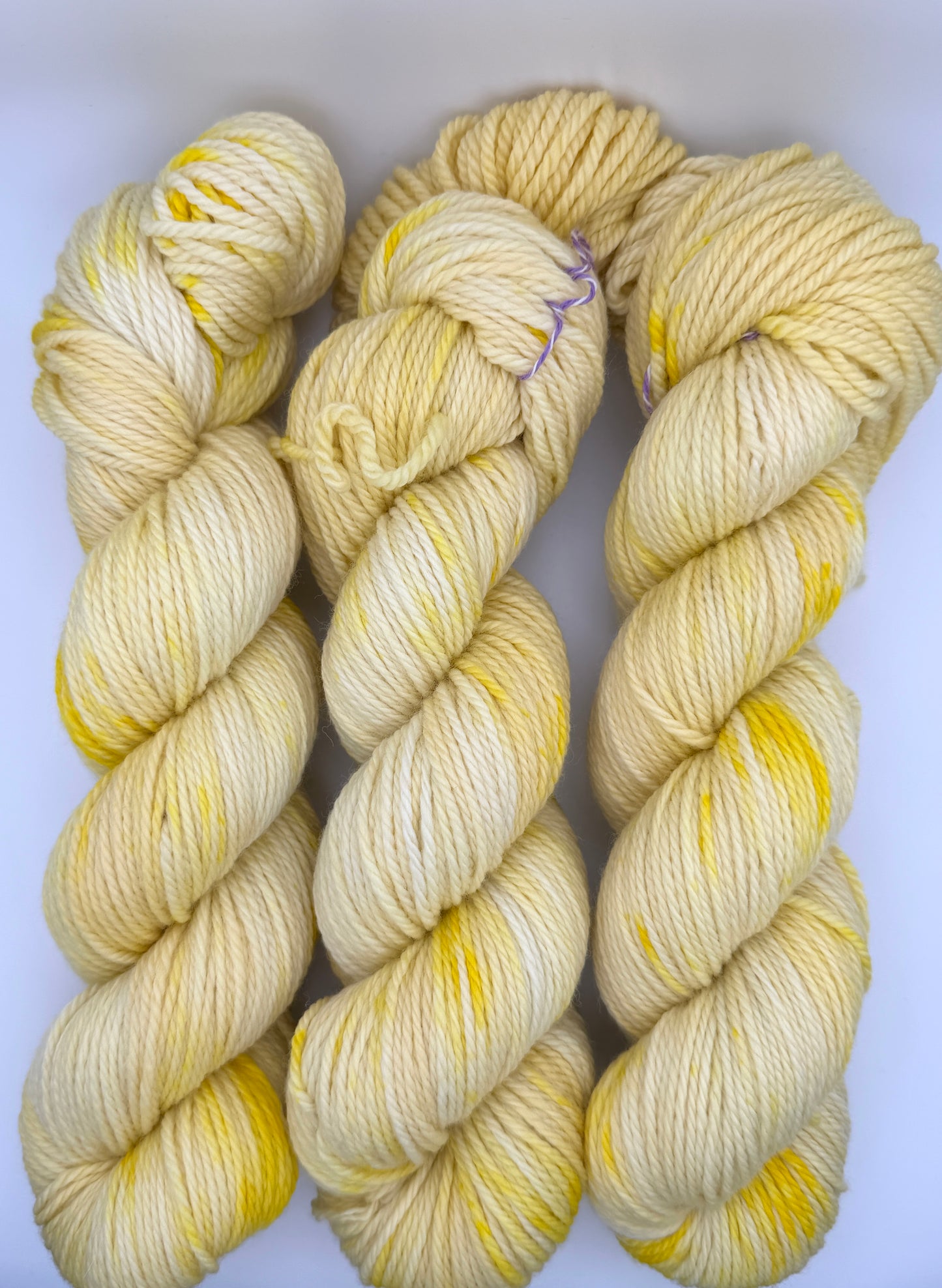 Hand dyed yarn UK available in 4ply sock, aran, DK in Lemon Posset colourway – Lemon, Yellow and Citrus tones.