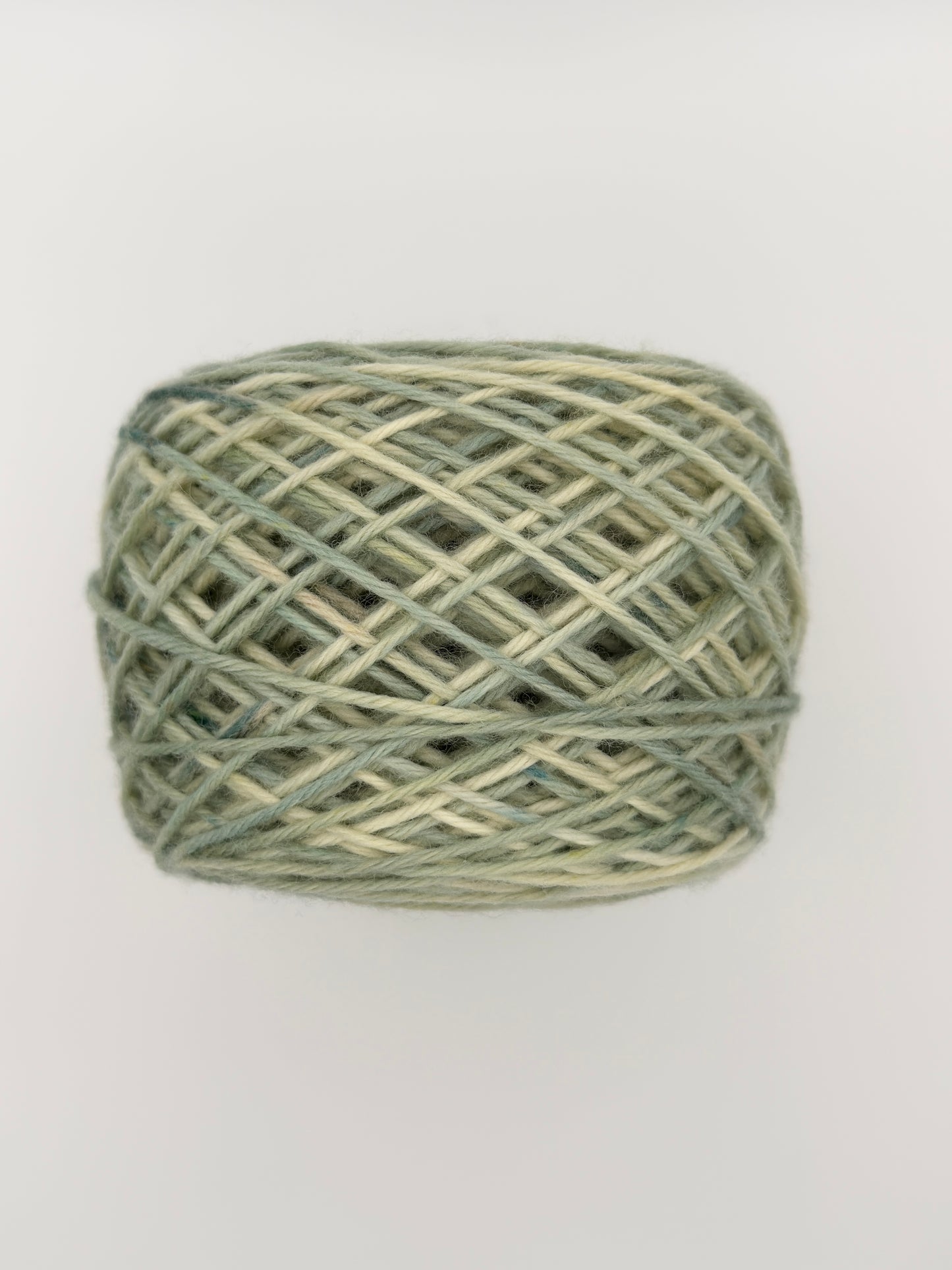 Hand dyed yarn available in 4ply sock, aran, DK in Mellow Sage colourway – green and neutral tones