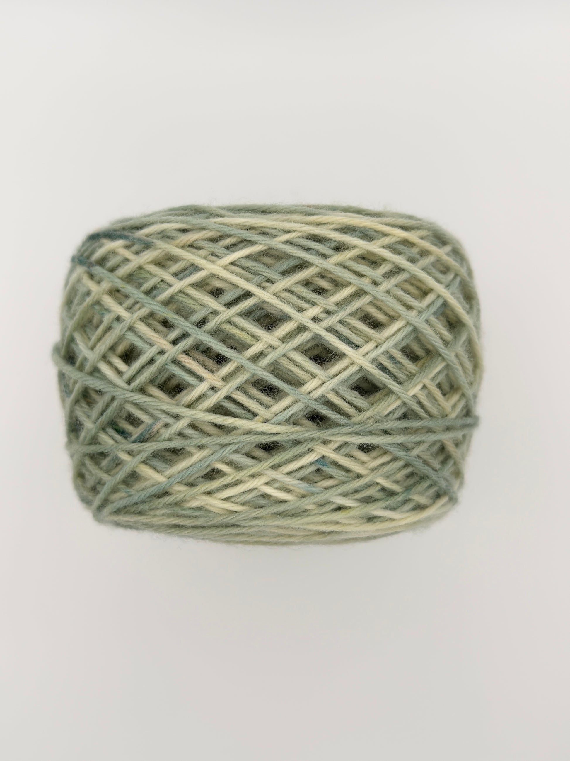 Hand dyed yarn available in 4ply sock, aran, DK in Mellow Sage colourway – green and neutral tones