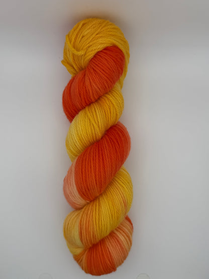 Hand dyed yarn available in 4ply sock, Aran, DK in Tequila Sunrise colourway – orange and yellow tones